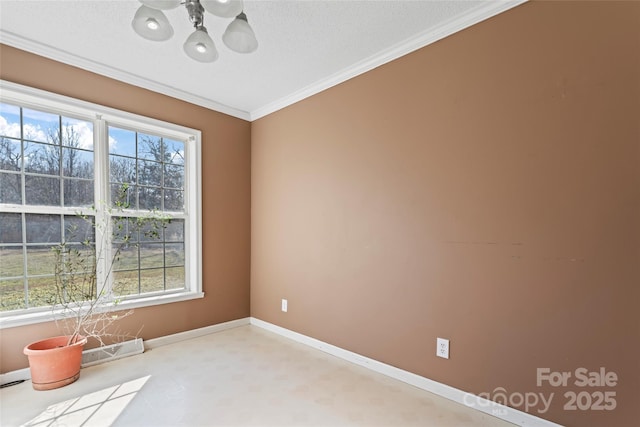 unfurnished room featuring crown molding and a wealth of natural light