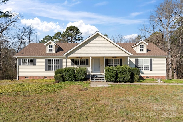 new england style home with a front lawn and covered porch