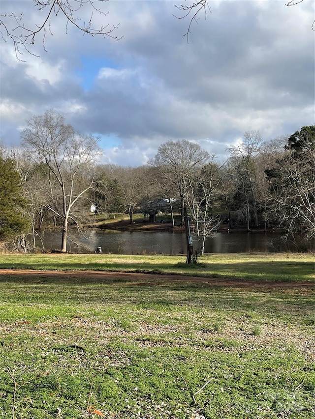 view of yard with a water view