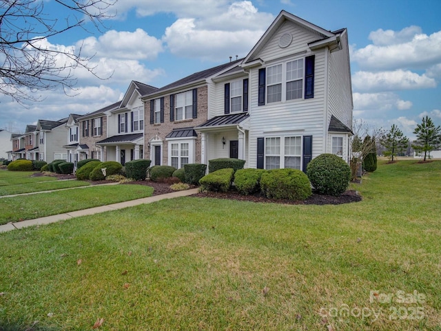 view of property with a front lawn