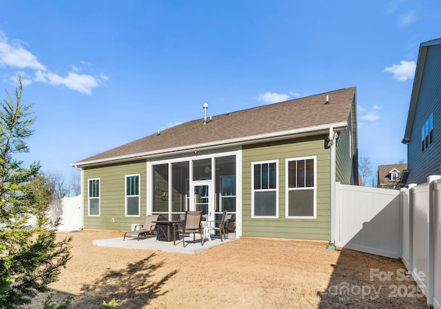 rear view of house with a patio area