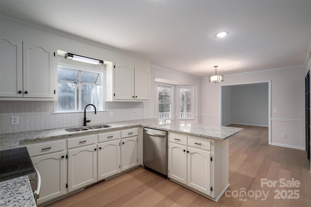 kitchen with dishwasher, sink, hanging light fixtures, kitchen peninsula, and white cabinetry