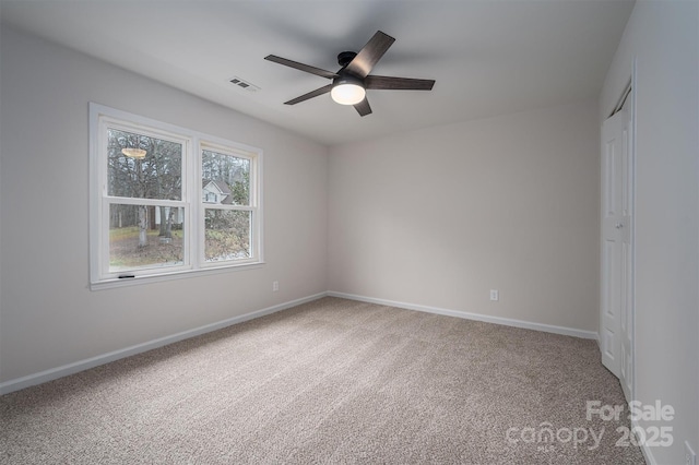 unfurnished bedroom with carpet flooring, a closet, and ceiling fan