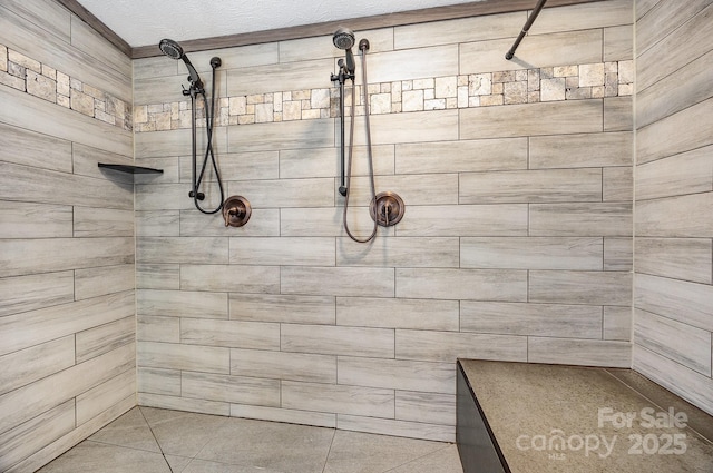 bathroom featuring a tile shower