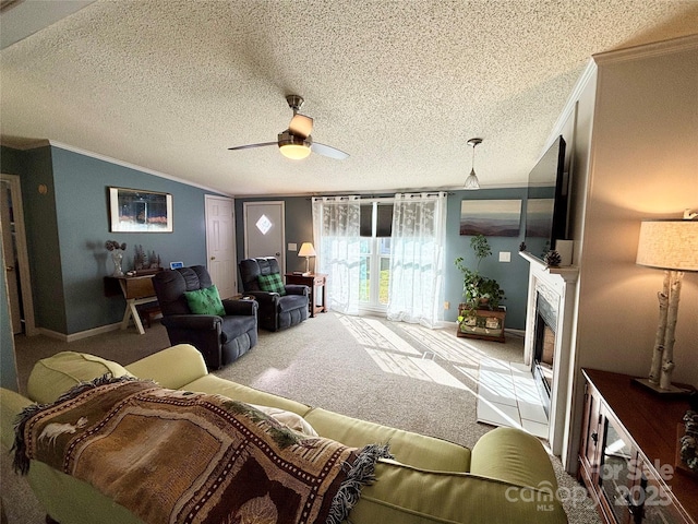 carpeted living room featuring a textured ceiling, ceiling fan, and crown molding