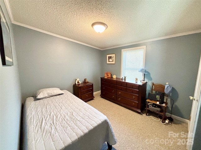 bedroom with a textured ceiling, ornamental molding, and light carpet