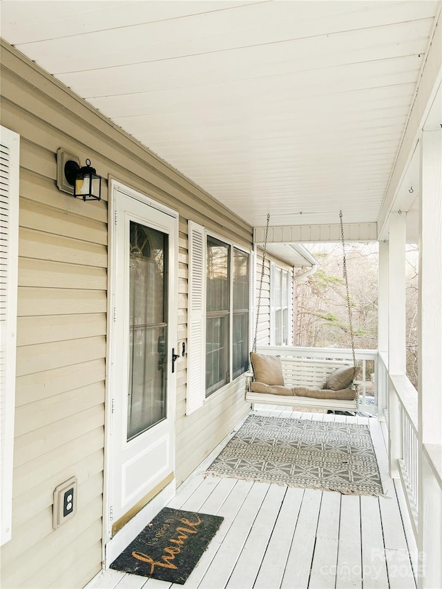 deck with covered porch