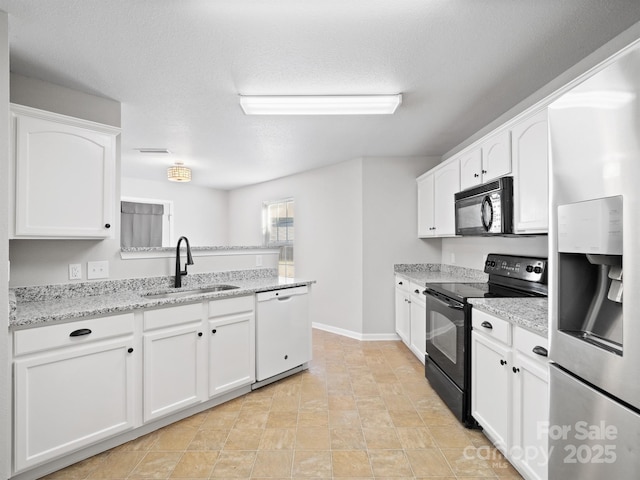 kitchen featuring light stone counters, a textured ceiling, sink, black appliances, and white cabinets