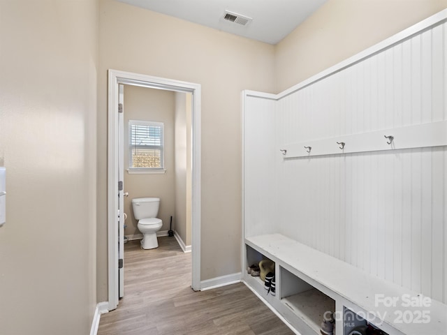 mudroom featuring wood-type flooring