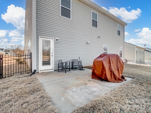 back of property featuring a patio