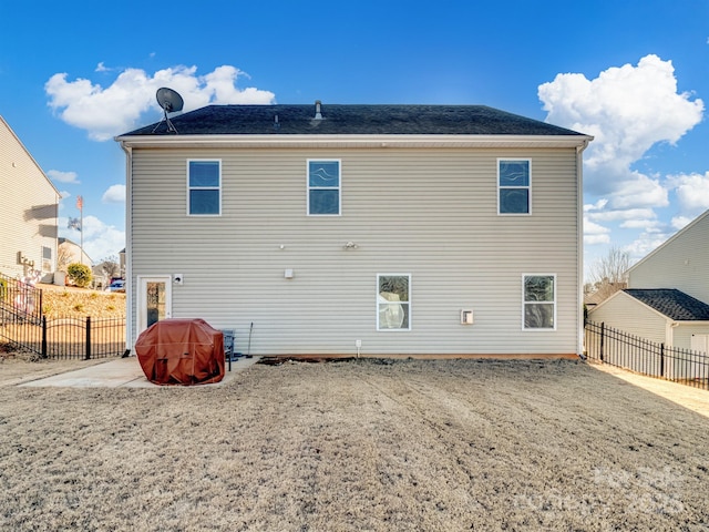 back of property featuring a patio area