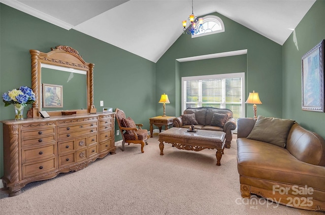 living area with vaulted ceiling, a chandelier, carpet flooring, and a healthy amount of sunlight