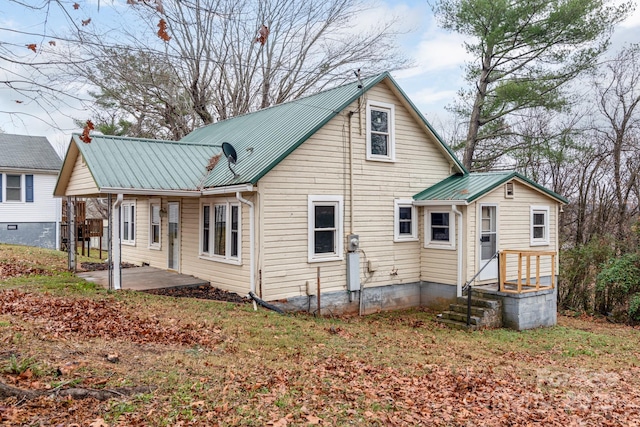 back of property with a patio area