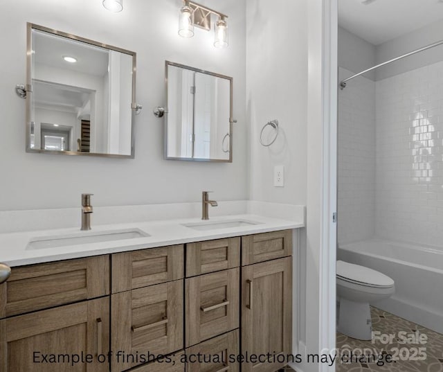 full bathroom featuring tiled shower / bath combo, vanity, toilet, and tile patterned floors