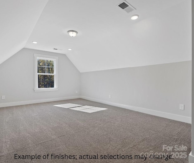 bonus room with carpet and lofted ceiling