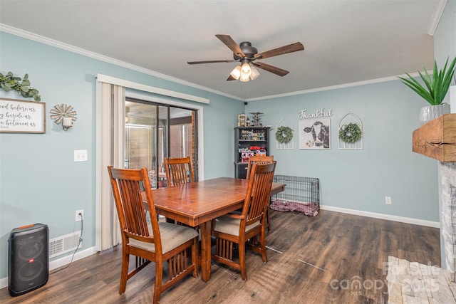 dining room with ceiling fan, dark hardwood / wood-style floors, and ornamental molding