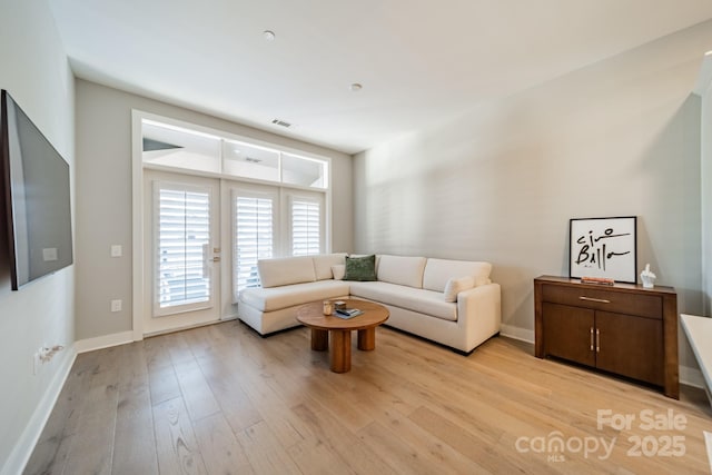 living room featuring light hardwood / wood-style flooring