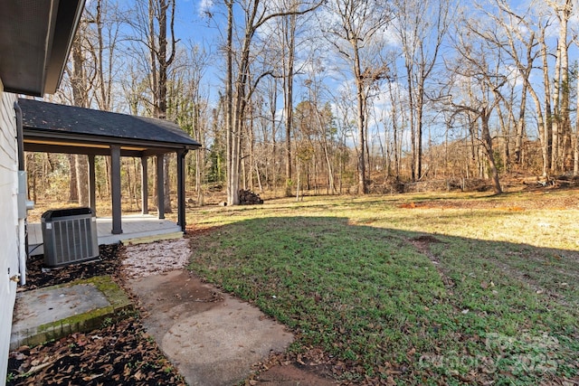 view of yard featuring central AC unit