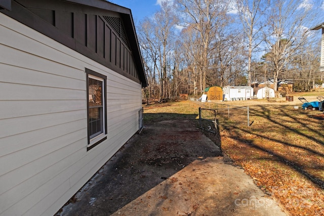 view of home's exterior featuring a shed