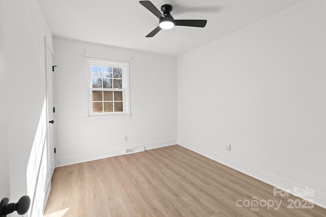 unfurnished room with ceiling fan and light hardwood / wood-style floors