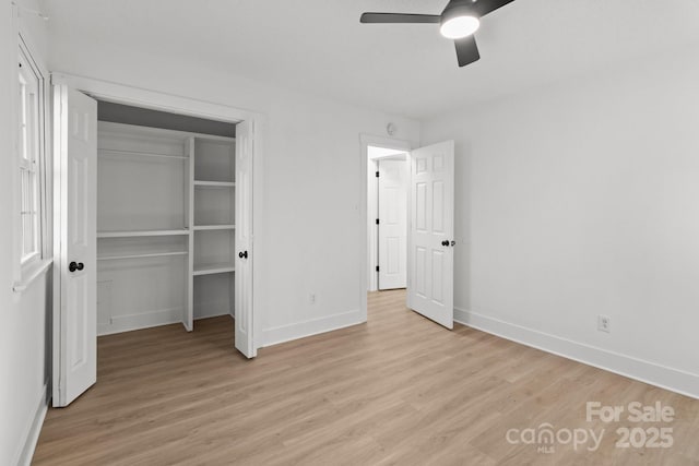 unfurnished bedroom featuring a closet, ceiling fan, and light hardwood / wood-style floors