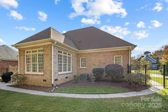 view of side of property with a yard