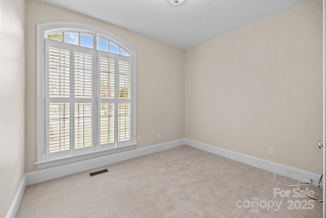 view of carpeted spare room