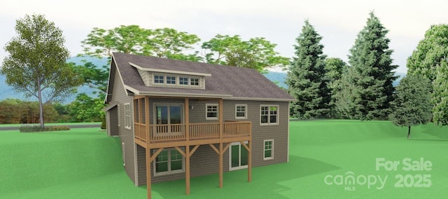 back of house with a wooden deck and a lawn