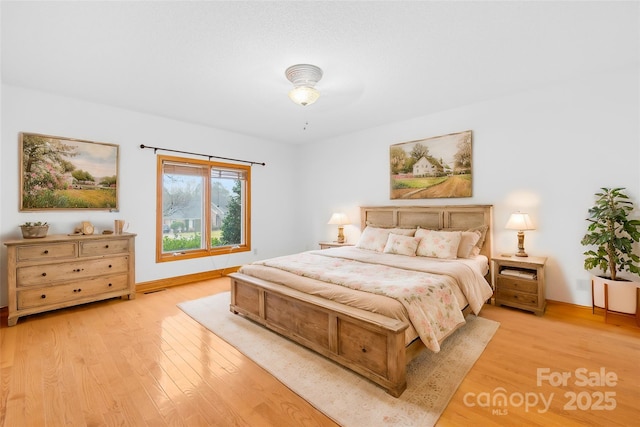 bedroom featuring light wood-type flooring