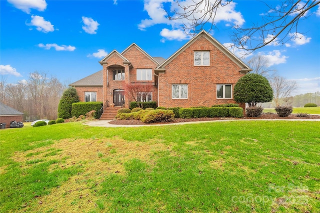 view of front property with a front lawn