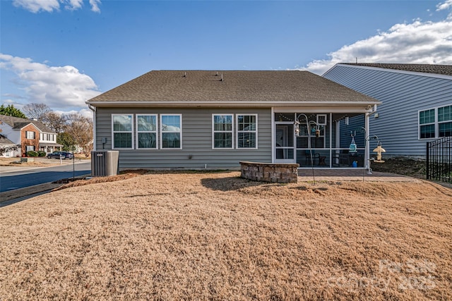 back of property featuring central AC unit