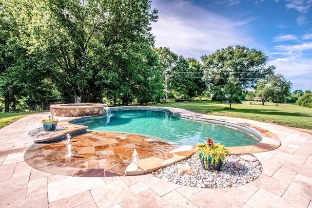 view of swimming pool with a patio area, an in ground hot tub, and a yard