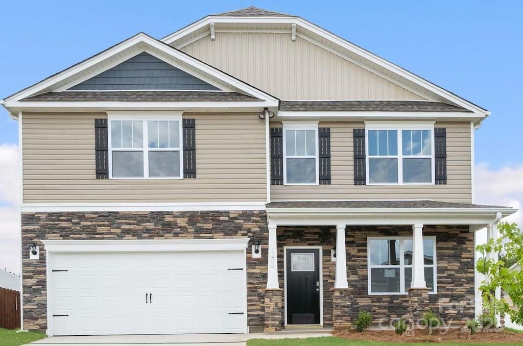 craftsman house featuring a garage