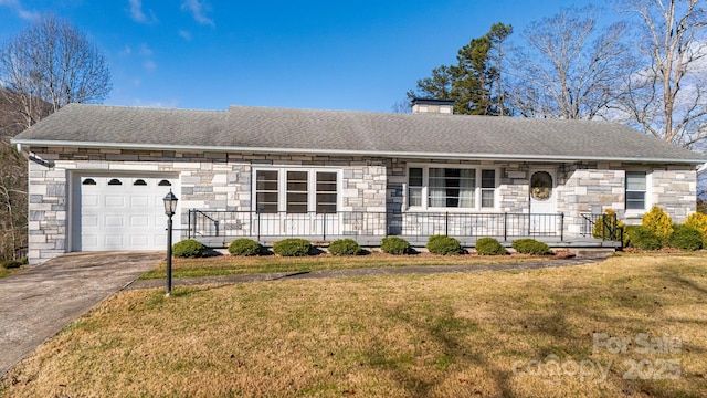 ranch-style home with a porch, a garage, and a front yard