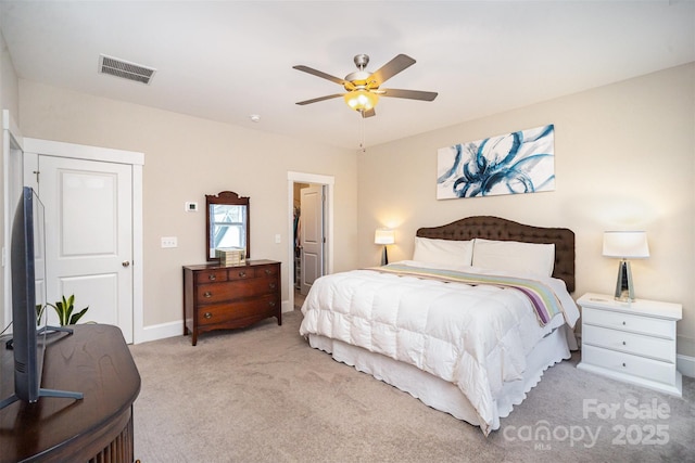 carpeted bedroom featuring ceiling fan