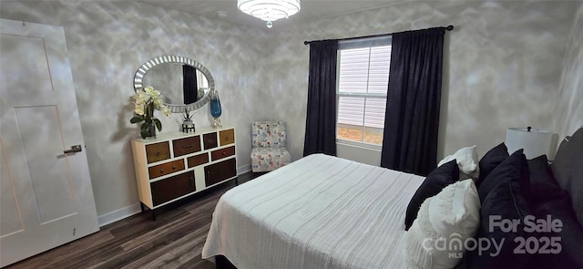 bedroom featuring dark wood-type flooring