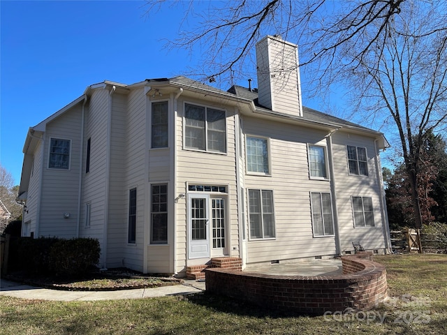 rear view of house featuring a patio area