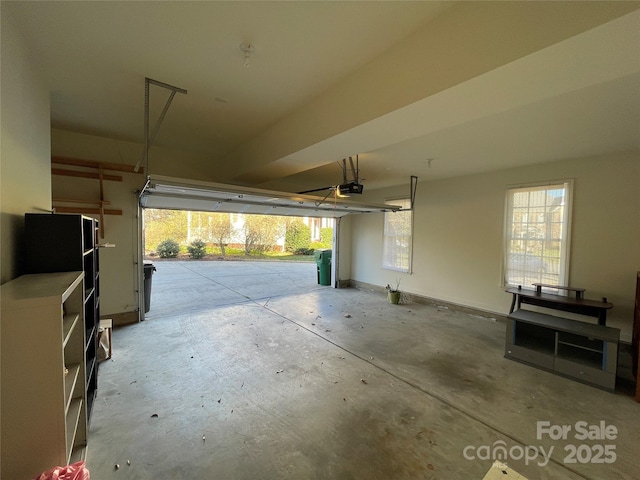 garage featuring a garage door opener