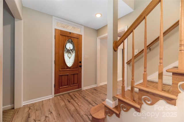 entrance foyer with light hardwood / wood-style floors