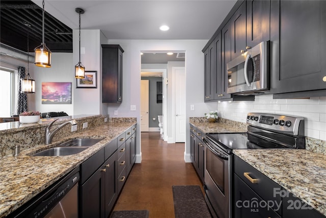 2338 Yadkin Ave Unit 505, Charlotte, NC 28205 - kitchen featuring appliances with stainless steel finishes, a sink, backsplash, light stone counters, and recessed lighting