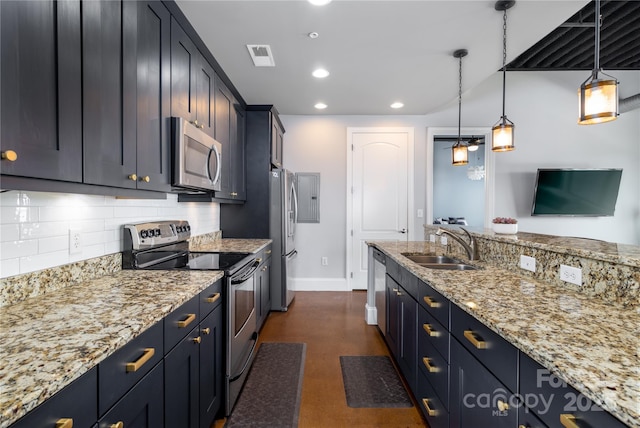 2338 Yadkin Ave Unit 505, Charlotte, NC 28205 - kitchen with appliances with stainless steel finishes, a sink, recessed lighting, baseboards, and backsplash