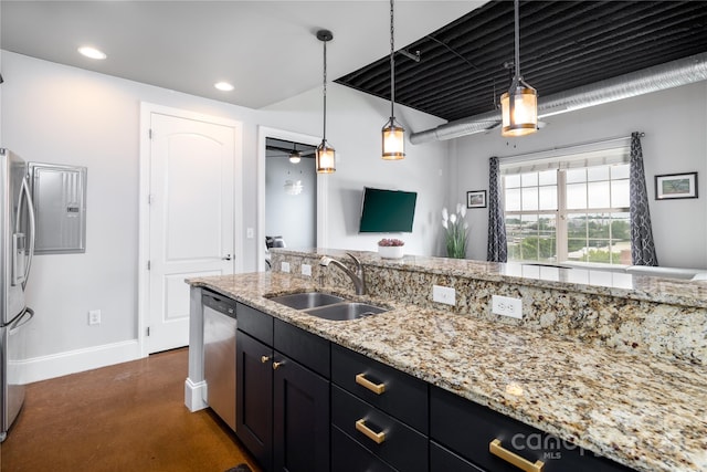 2338 Yadkin Ave Unit 505, Charlotte, NC 28205 - kitchen with a sink, stainless steel appliances, a ceiling fan, baseboards, and pendant lighting