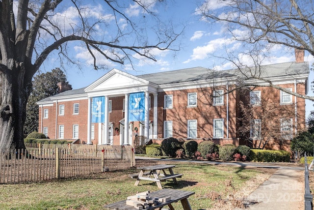 2338 Yadkin Ave Unit 505, Charlotte, NC 28205 - greek revival inspired property featuring a chimney and brick siding