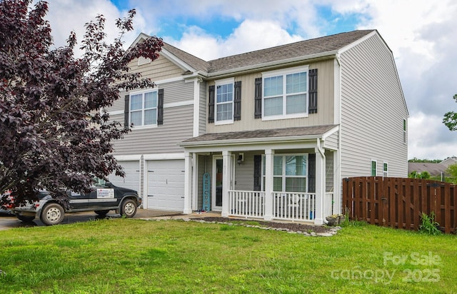 11677 Striker Ln, Midland, NC 28107 - view of front of property with covered porch, an attached garage, driveway, and a shingled roof