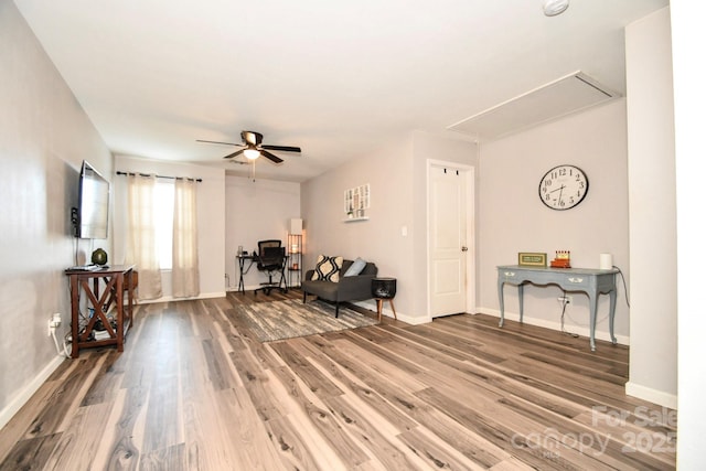11677 Striker Ln, Midland, NC 28107 - living area with attic access, wood finished floors, ceiling fan, and baseboards