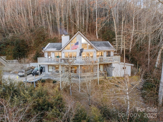 exterior space featuring a wooden deck