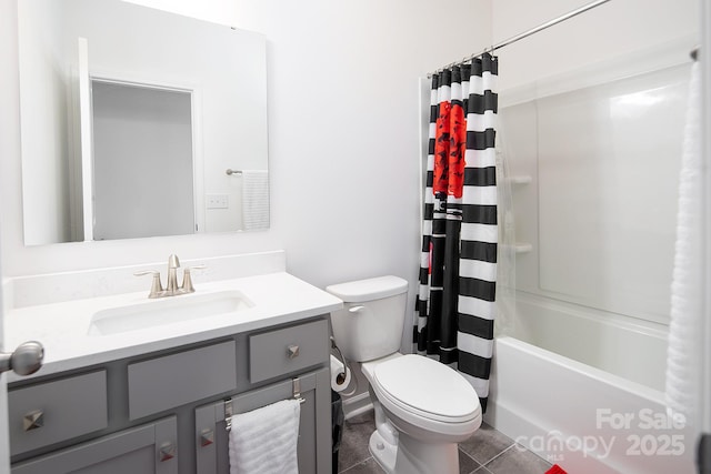 full bathroom featuring tile patterned floors, shower / tub combo with curtain, vanity, and toilet