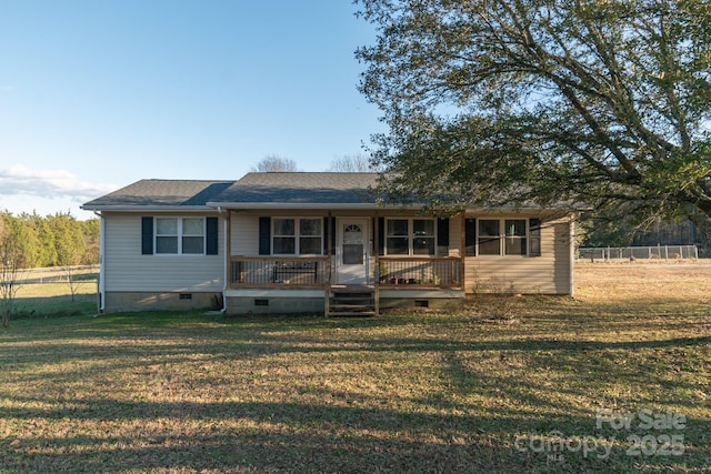 single story home featuring a porch and a front lawn