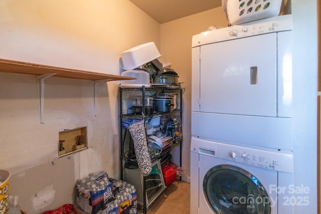 laundry room featuring stacked washing maching and dryer