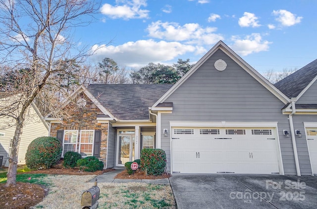 view of front of home with a garage